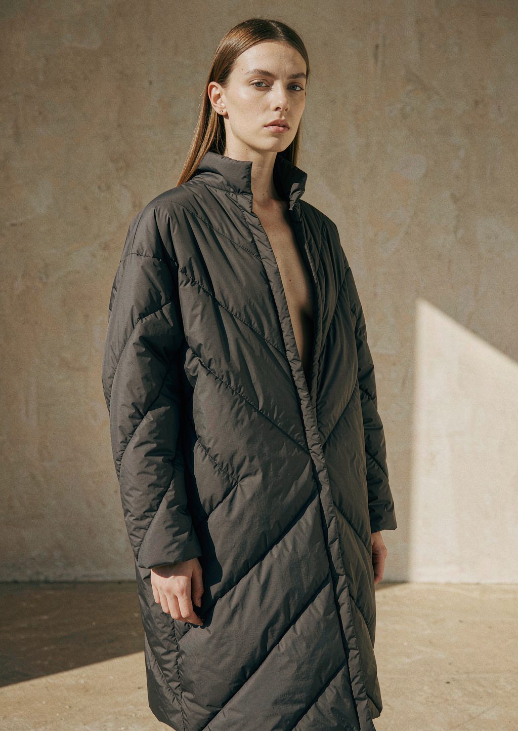 Matte quilted padded coat in charcoal
